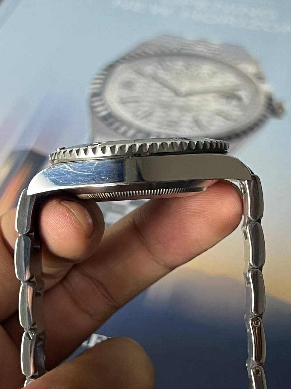 May be an image of wrist watch