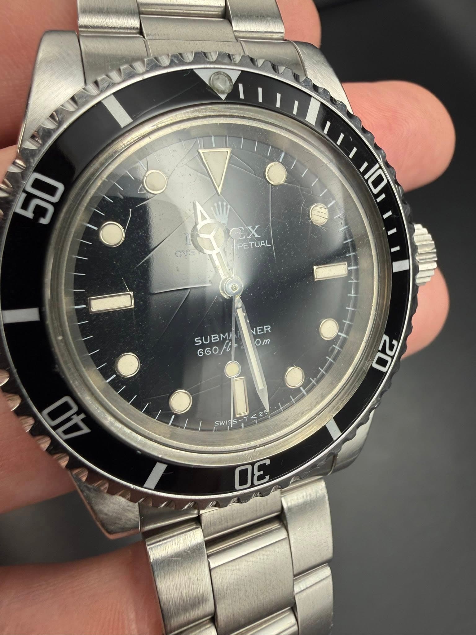May be an image of wrist watch and text that says 'ls 50 10 EX PETUAL OYS NER SUBM SUBMANER GGO/aom SUBM B GG0/6 0m 20 30'