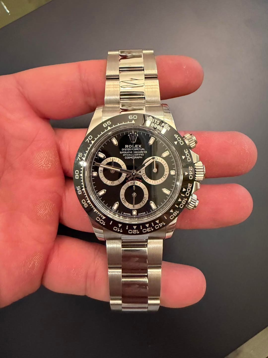 May be an image of wrist watch and text