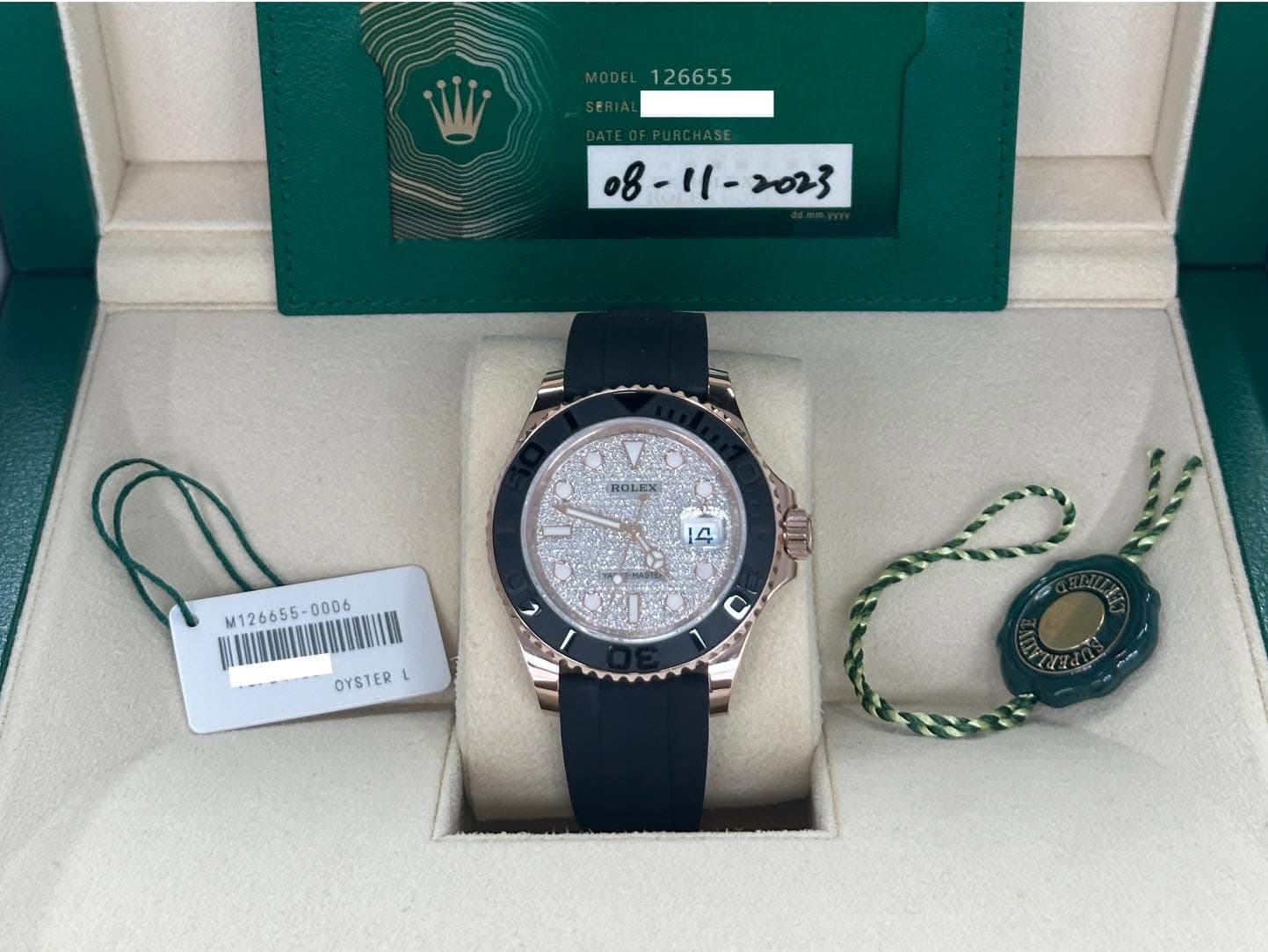 May be an image of wrist watch and text that says ' ROLE 郾 M126655- M126655-0006 006 WRMIINNIII OYSTER L 0'