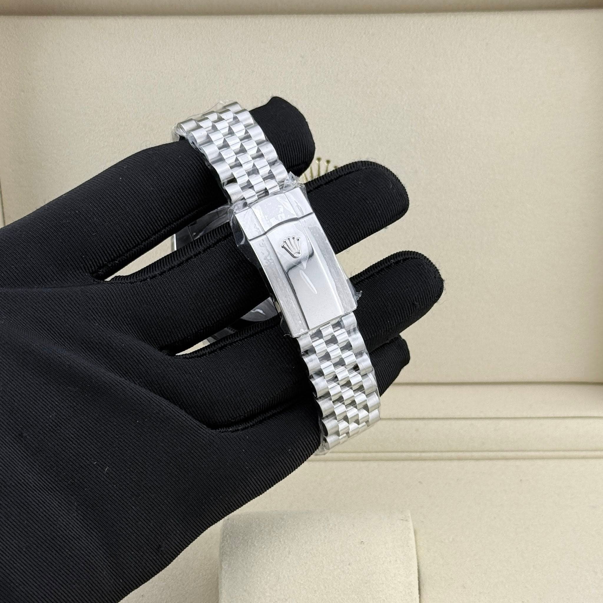 May be an image of jewelry and wrist watch