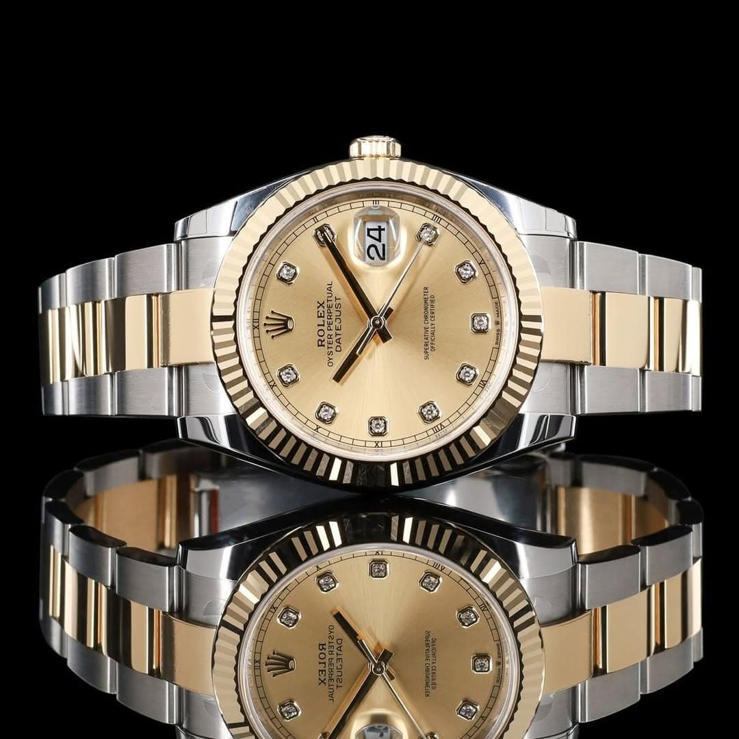 May be an image of wrist watch and text