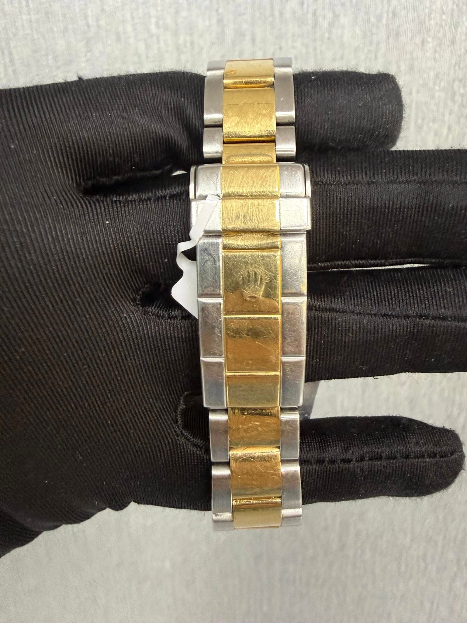 May be an image of wrist watch