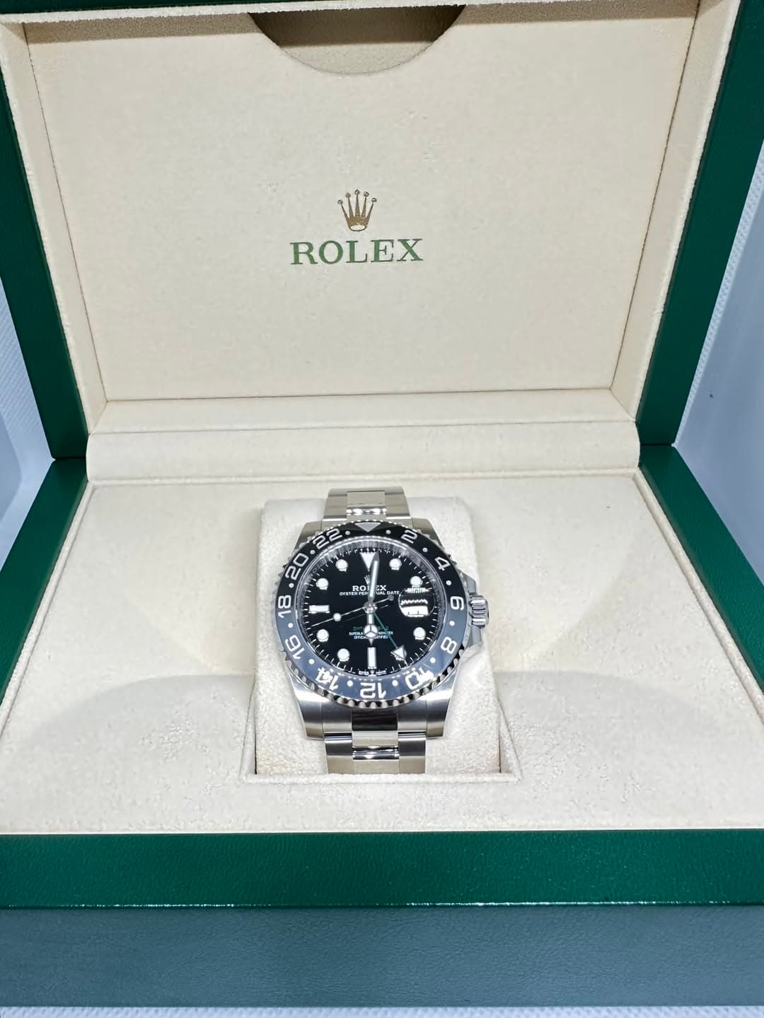 May be an image of wrist watch and text