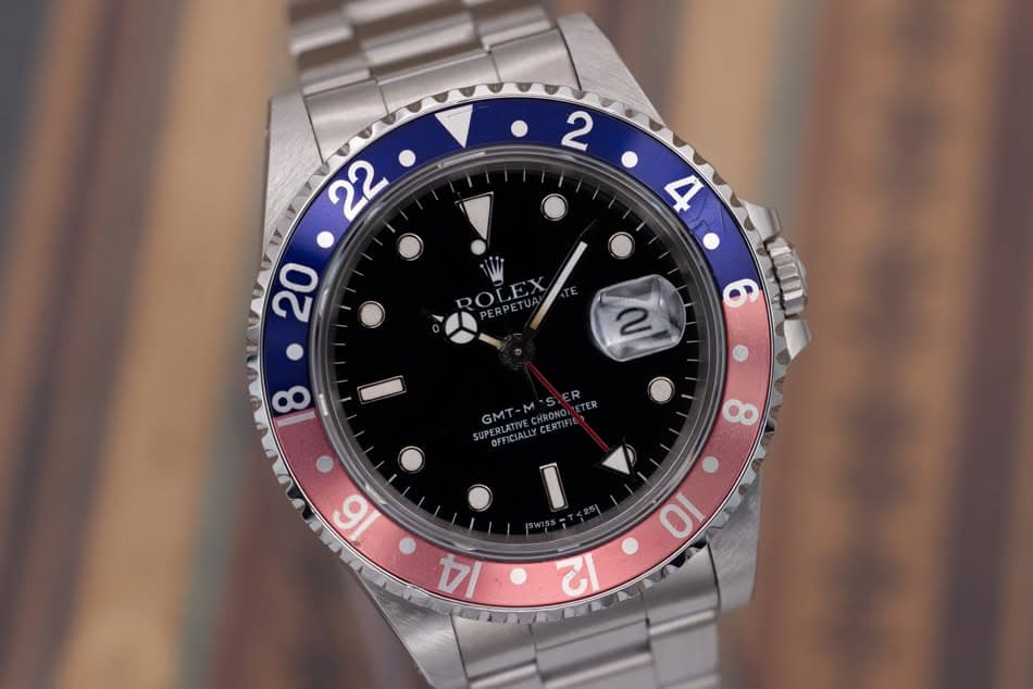 May be an image of wrist watch and text that says ' GMT- RLATIVECHRONO CERTIF M'STER LATIVE SUPE CIALLY '