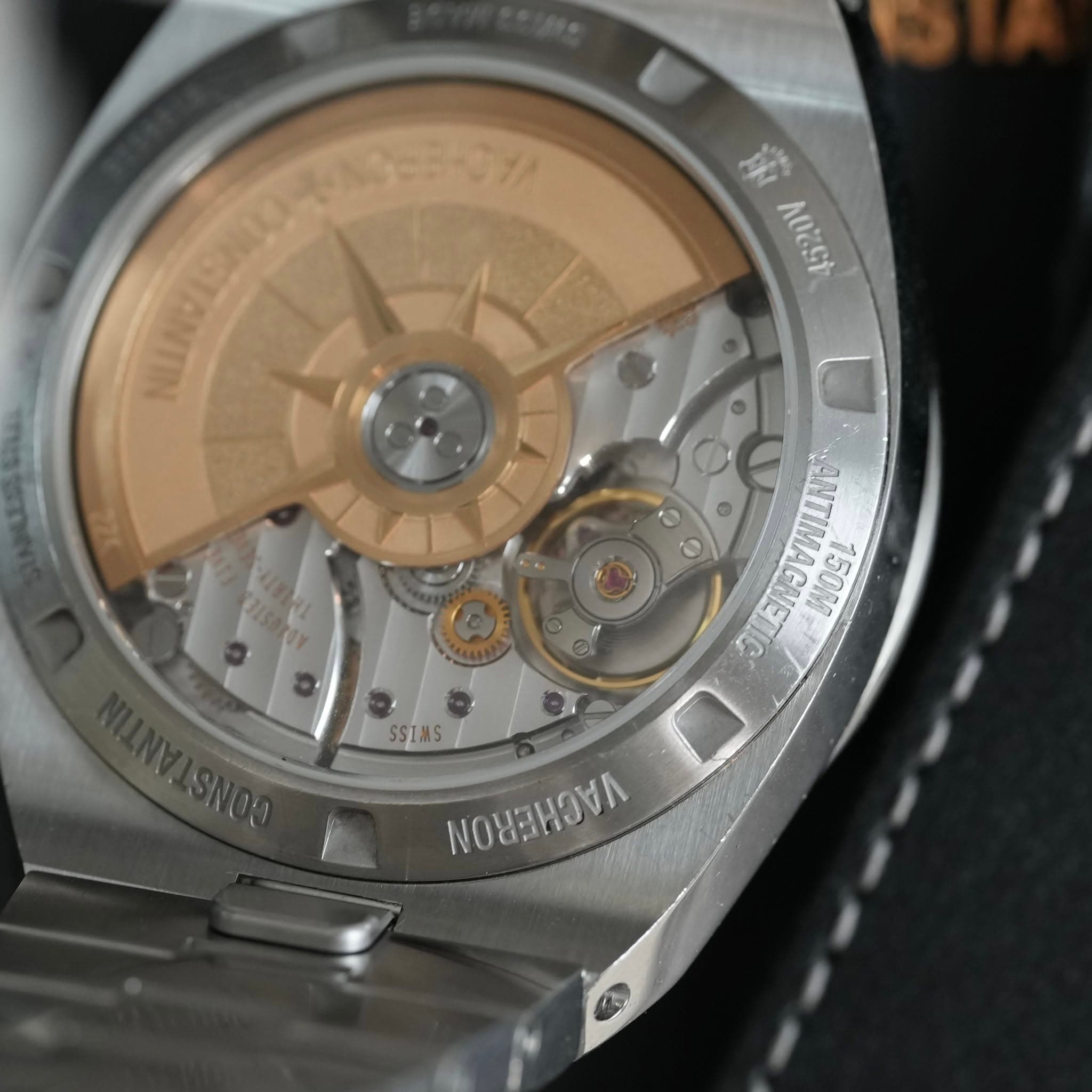 May be an image of wrist watch and text
