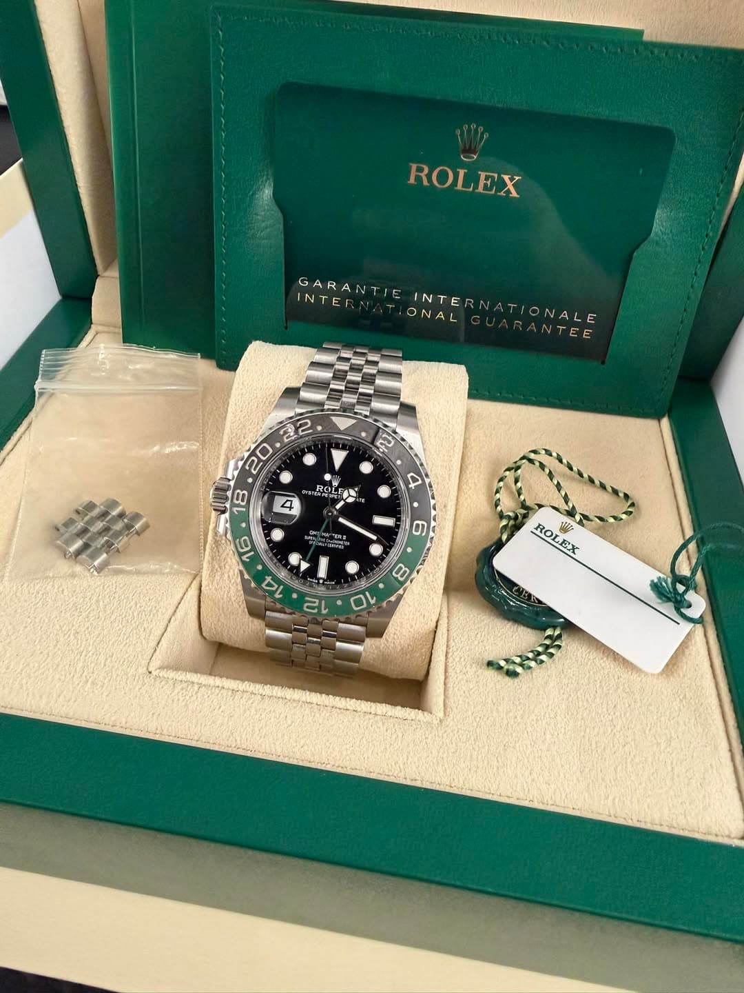 May be an image of wrist watch and text