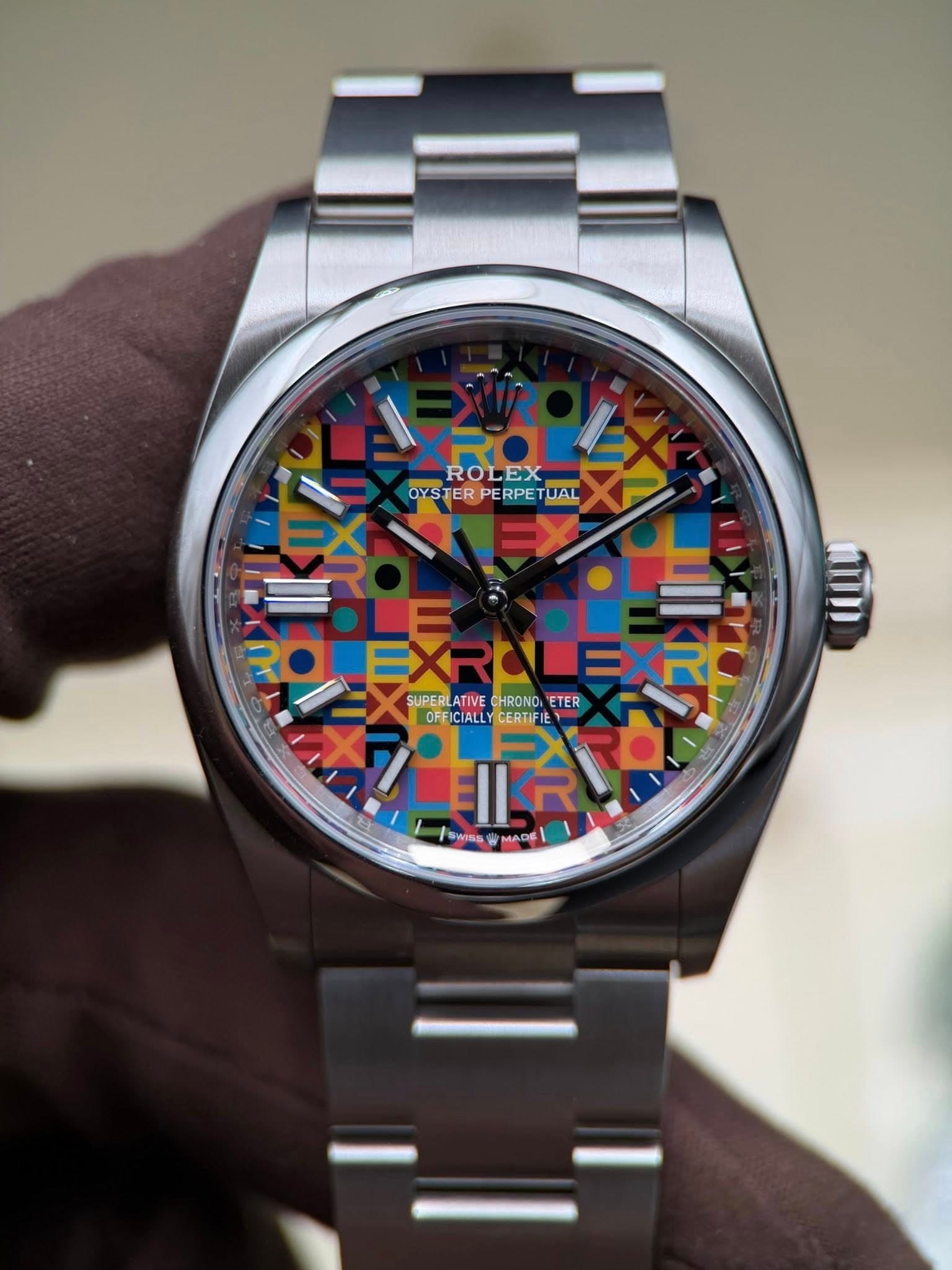 May be an image of wrist watch and text that says 'ROLEX OYSTERPERPETUAL PERPE UAL OYSTER OYS 生 ดก SU 10 SUPERLATIVECHRONO.ETER EXRULEXR CHROND ETER SUPER LATIVE OFFICIALLY…