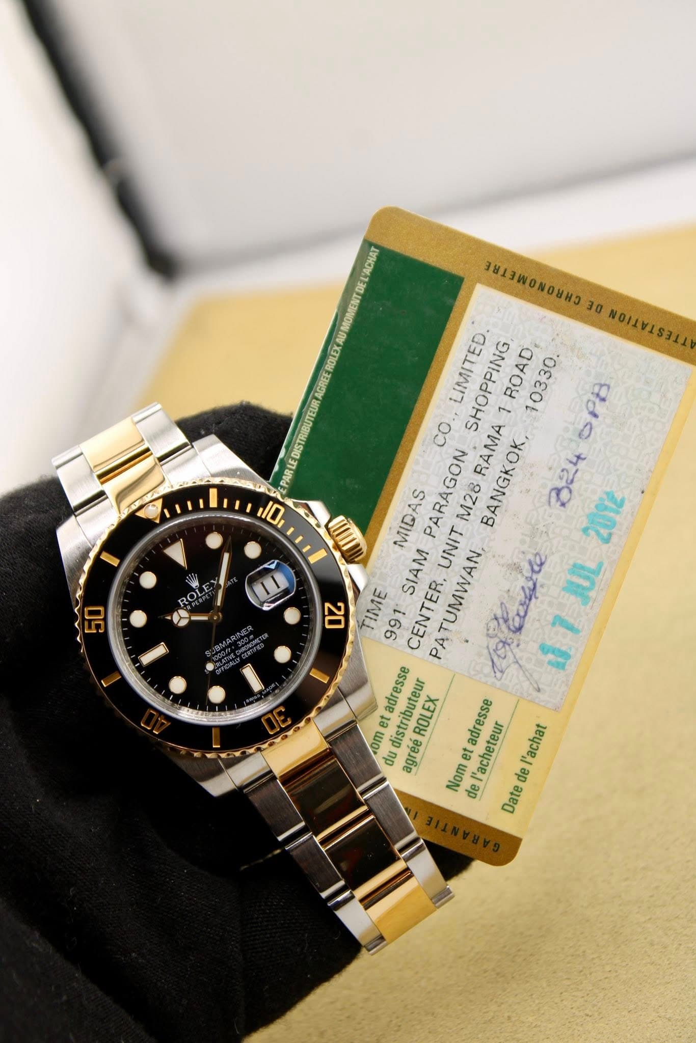 May be an image of wrist watch and text that says 'EL'ACHAT UMOMENT ROLEX AGREE STRIBUTEURA PARLE D I 1 CHNMMONANAT 30 TITTTTTTOO LIMITED 10330. OPB CO. RAMA BANGKOK, B24 SHOPPING.…