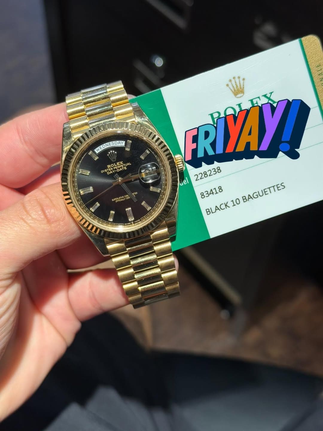 May be an image of wrist watch and text