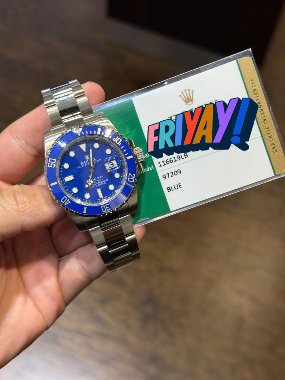 May be an image of wrist watch and text