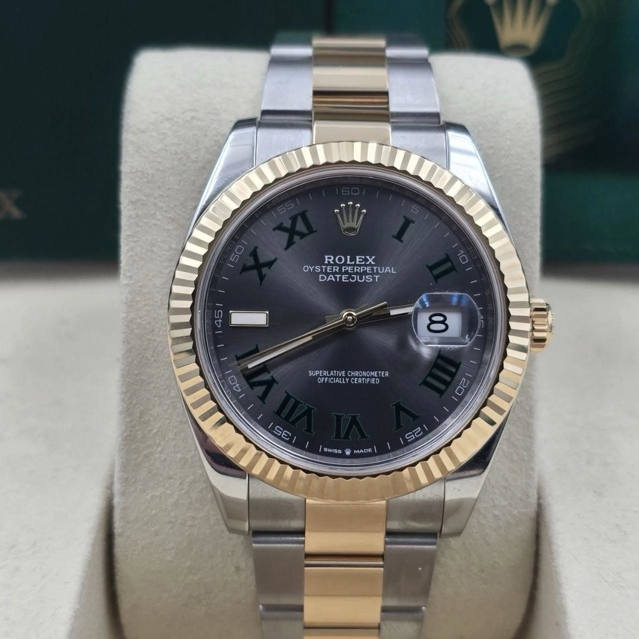 May be an image of wrist watch and text