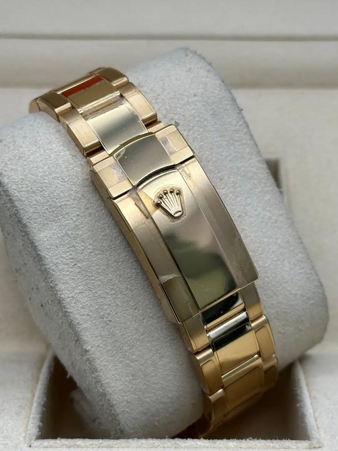 May be an image of wrist watch and jewelry
