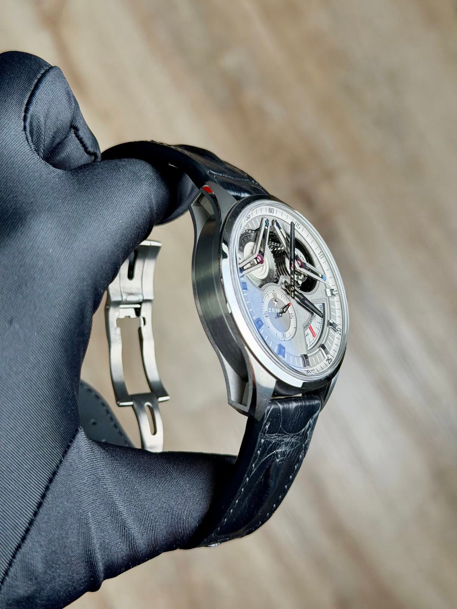 May be an image of wrist watch and text