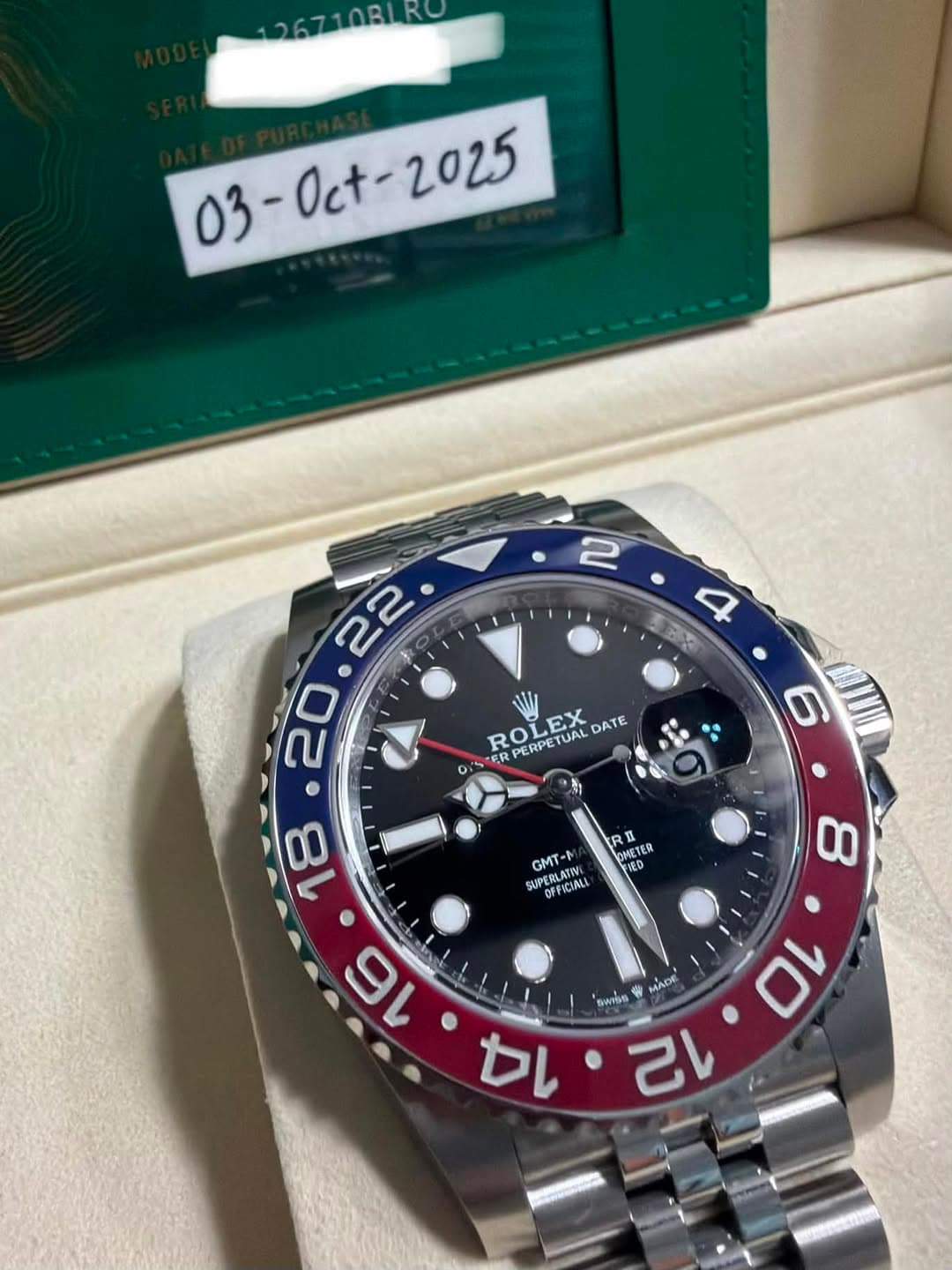 May be an image of wrist watch and text that says '03-Oct- R RO PERPETUAL EX O 0ι ER FR PERPE TUAL DATE R RI RT OME EED 先司 SMETE OMETER TER GMT- LATINE H SUPERLA SUPERLATWE…