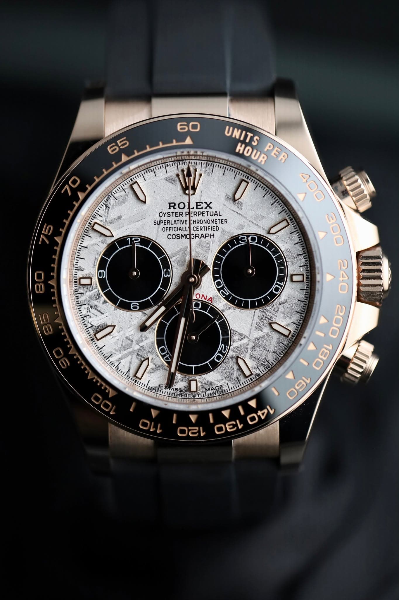 May be an image of wrist watch and text that says '60 65 ROLEX RO EX OYSTER STERPERPETUAI ERPETUAL SUPERLATIVE OFFICIALL CHRONOMETER CEOTICIED CERTIFIED TER COSMO COSMOGRAPH 0 P…