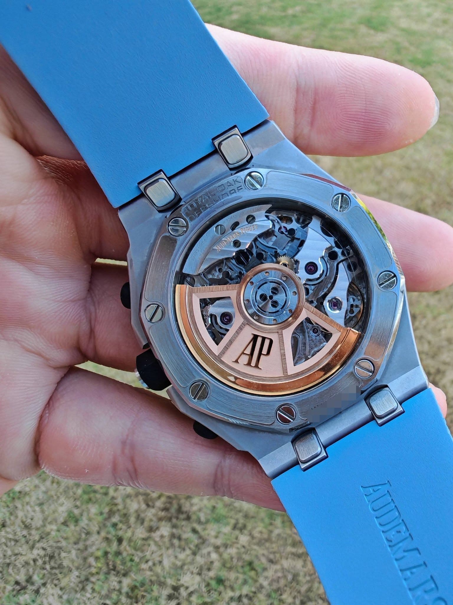May be an image of wrist watch and text