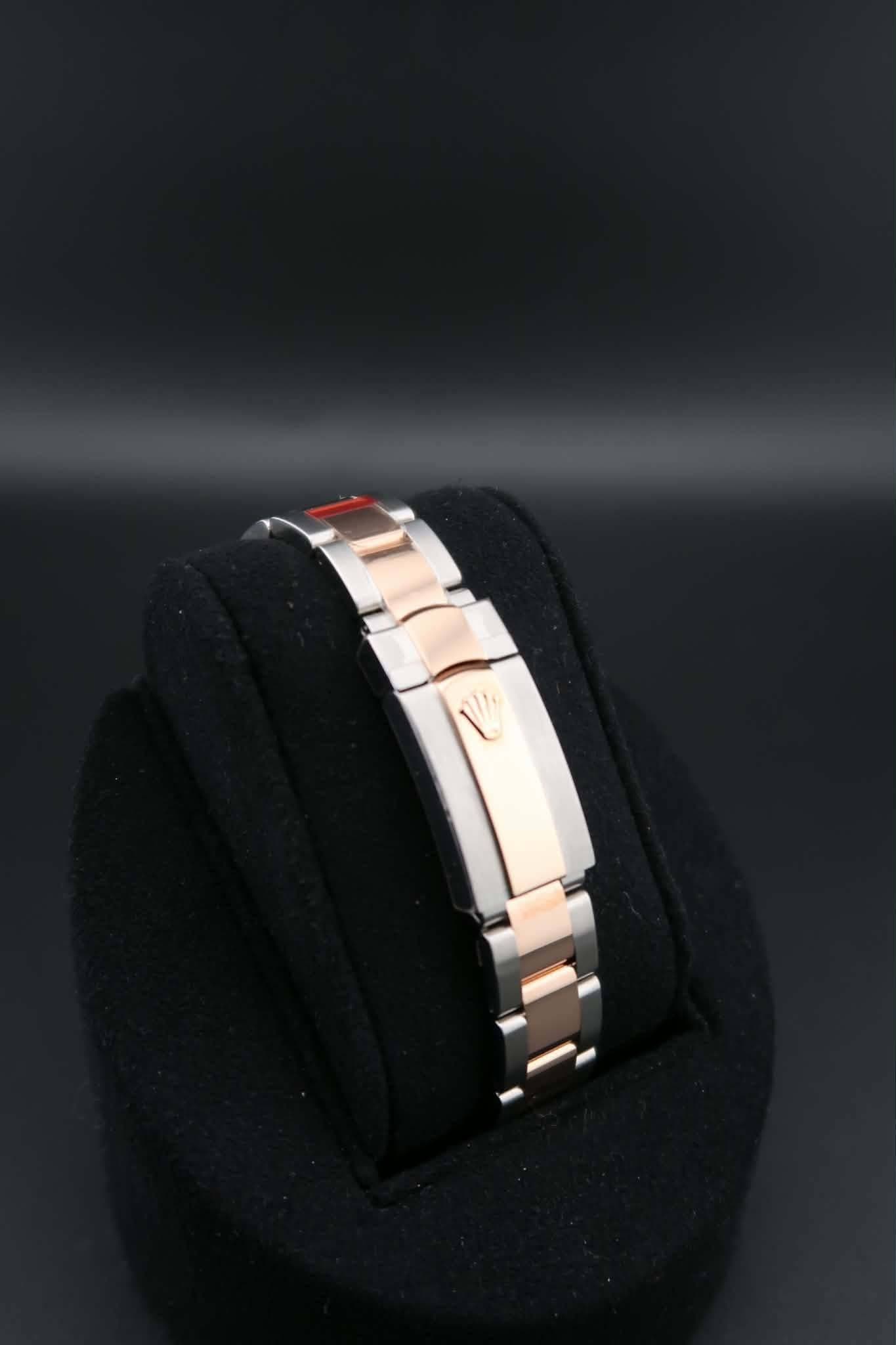 May be an image of wrist watch and jewelry