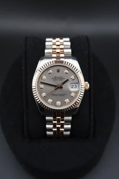 May be an image of wrist watch and text that says 'ניסיו וצן BOLEX EATRSUST RG का 23 U G'
