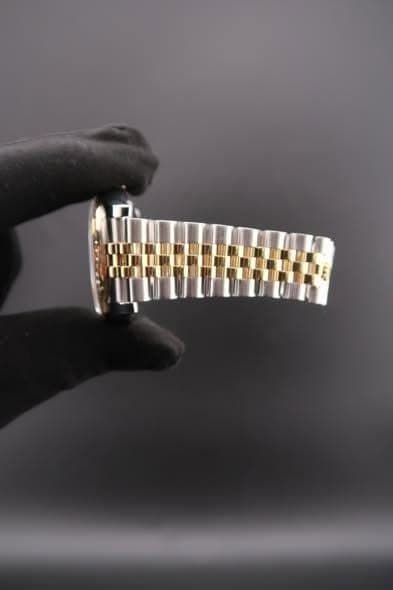 May be an image of wrist watch