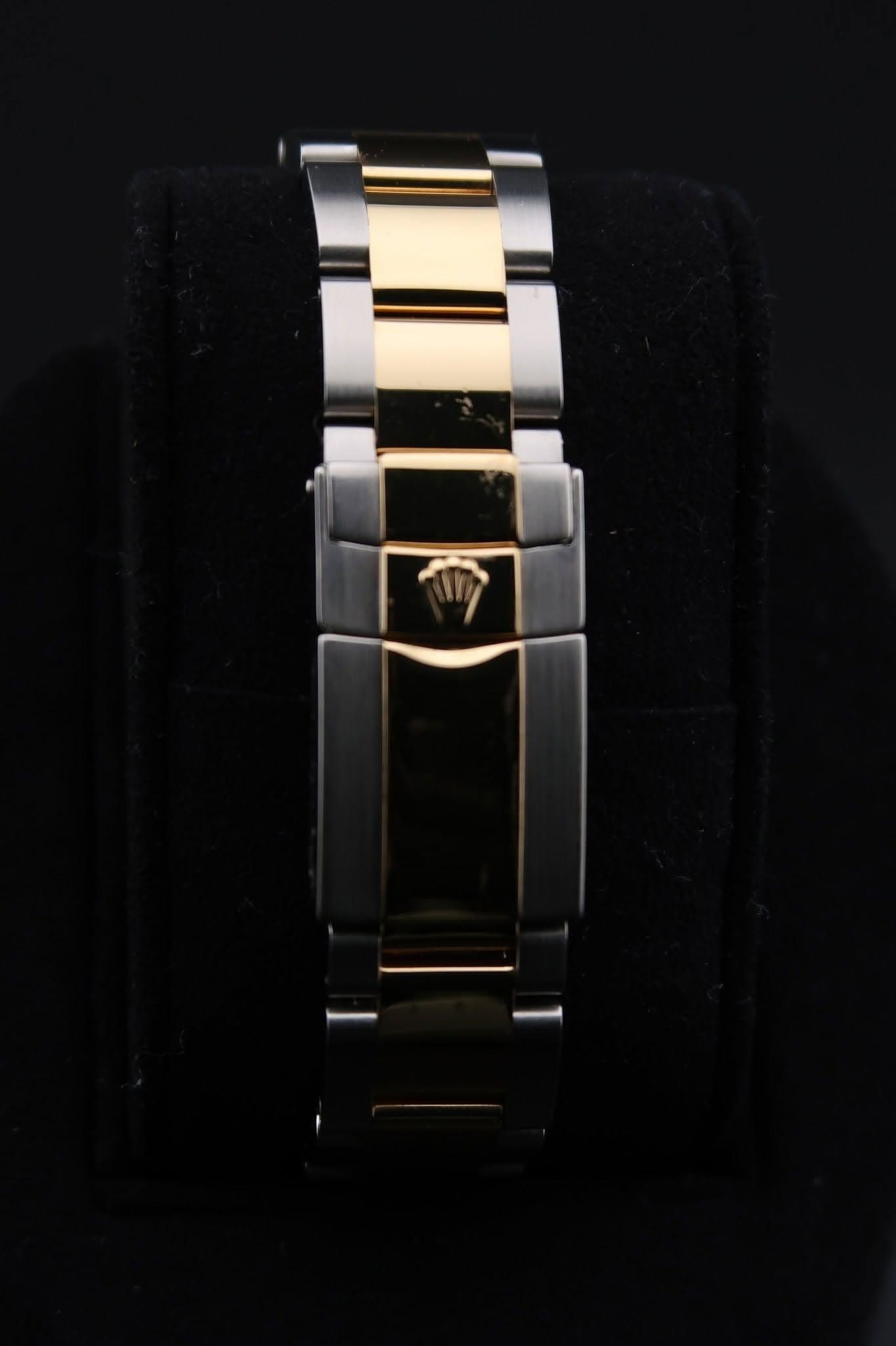 May be an image of jewelry and wrist watch