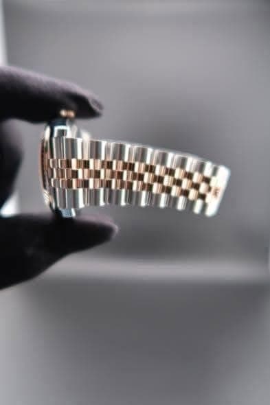 May be an image of wrist watch