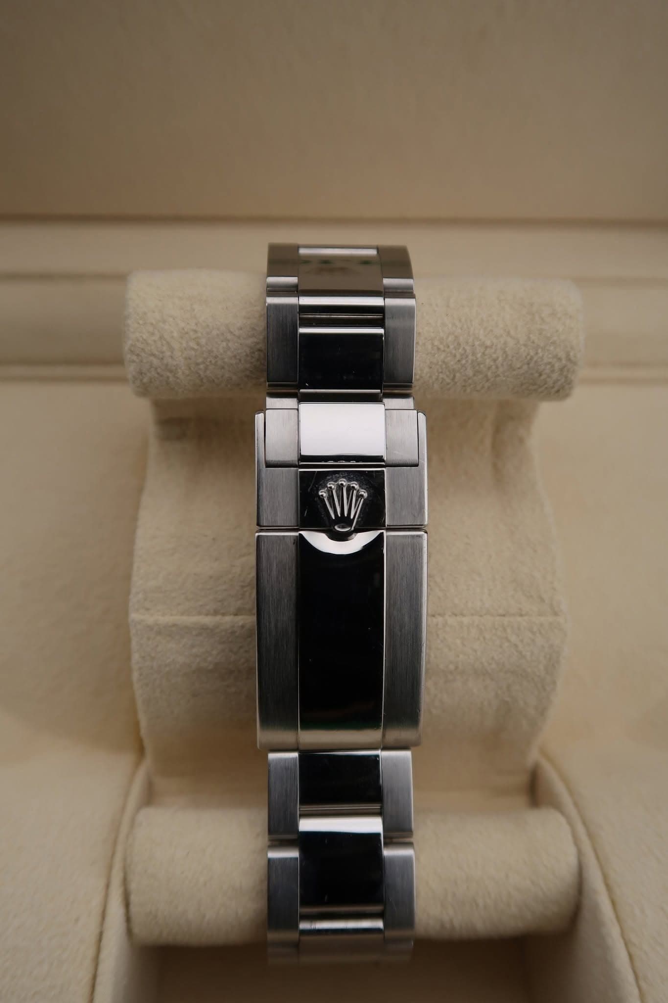May be an image of wrist watch and text