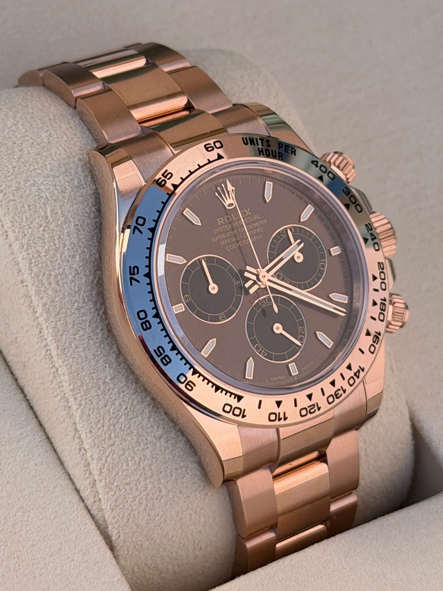 May be an image of wrist watch and text