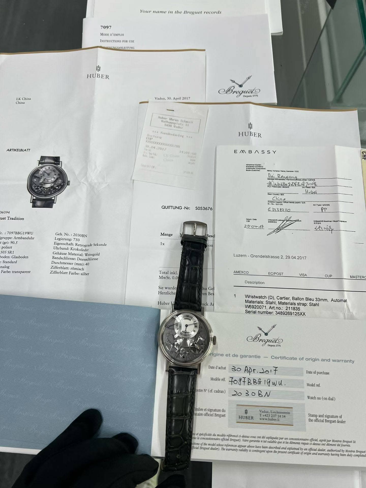 May be an image of wrist watch, ticket stub and text