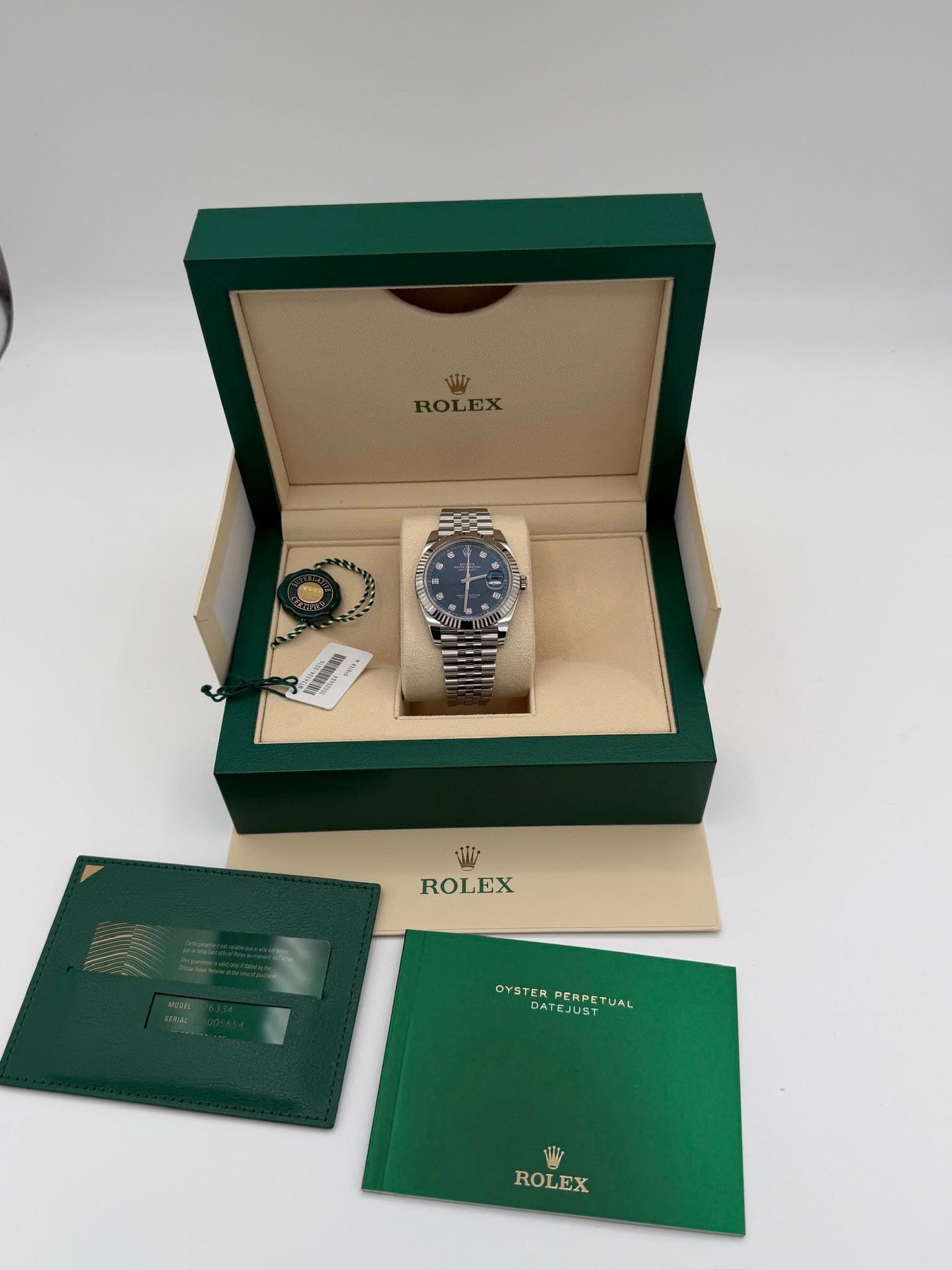 May be an image of wrist watch and text that says 'M ROLEX RO EX Ltt ROLEX OYSTER PERPE US DATEJUST OYSTERPERPETUAL UAL ROLEX ROLEX'