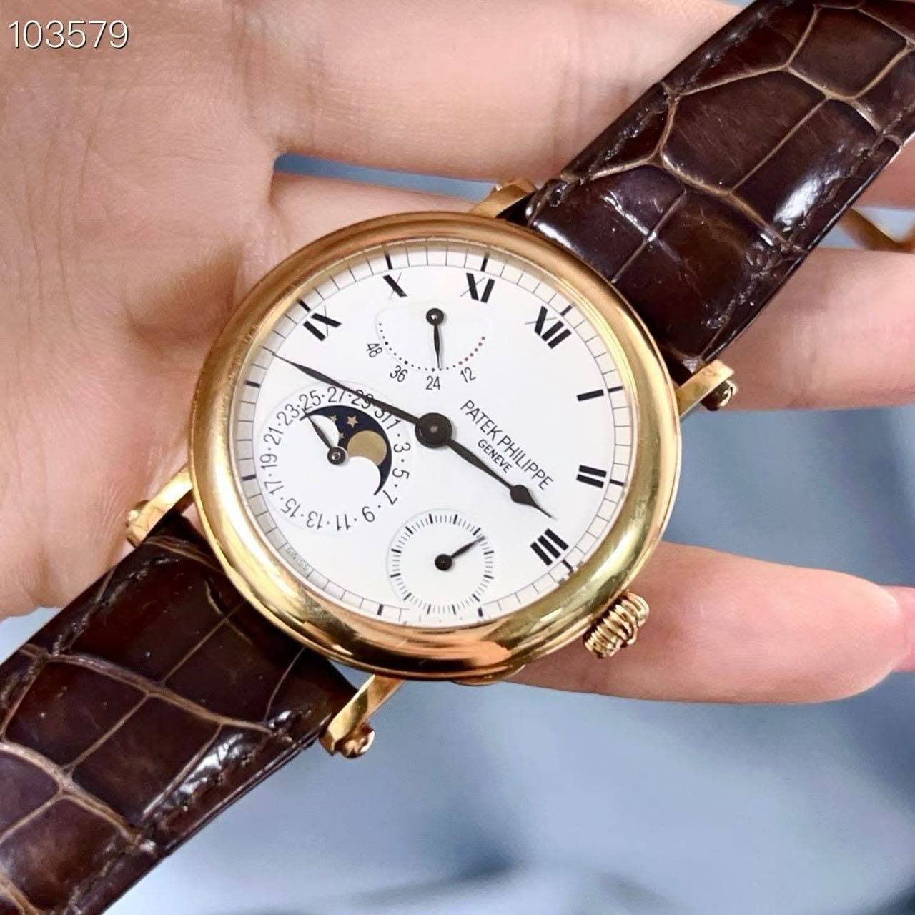 May be an image of wrist watch and text that says '103579 سي ι I d XII 36 24 36 PATEK GENEVE PATEKPHILIPPE PHILIPPE II 究 23: 3L 55 • cn 5 • ش co'