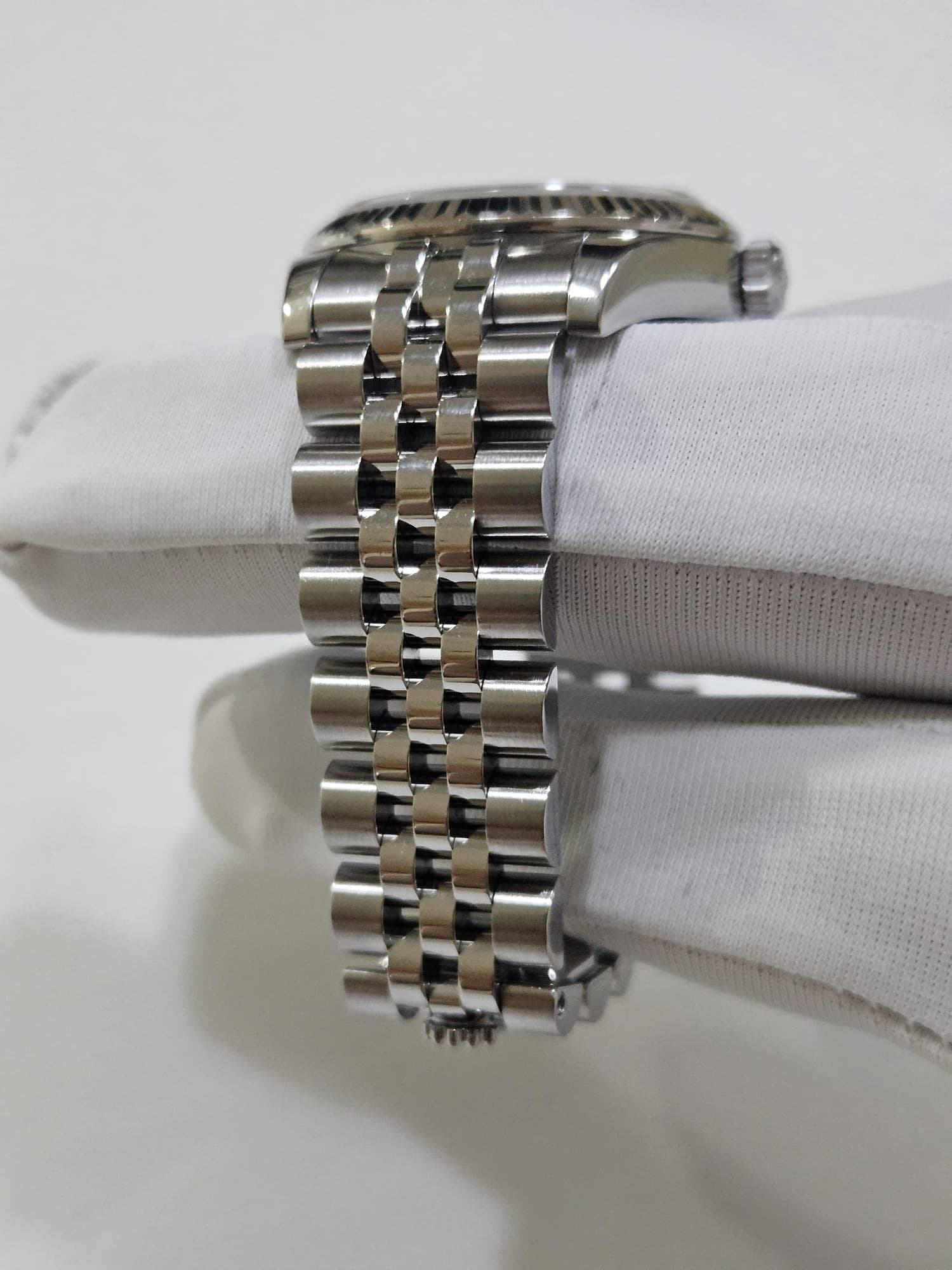 May be an image of wrist watch
