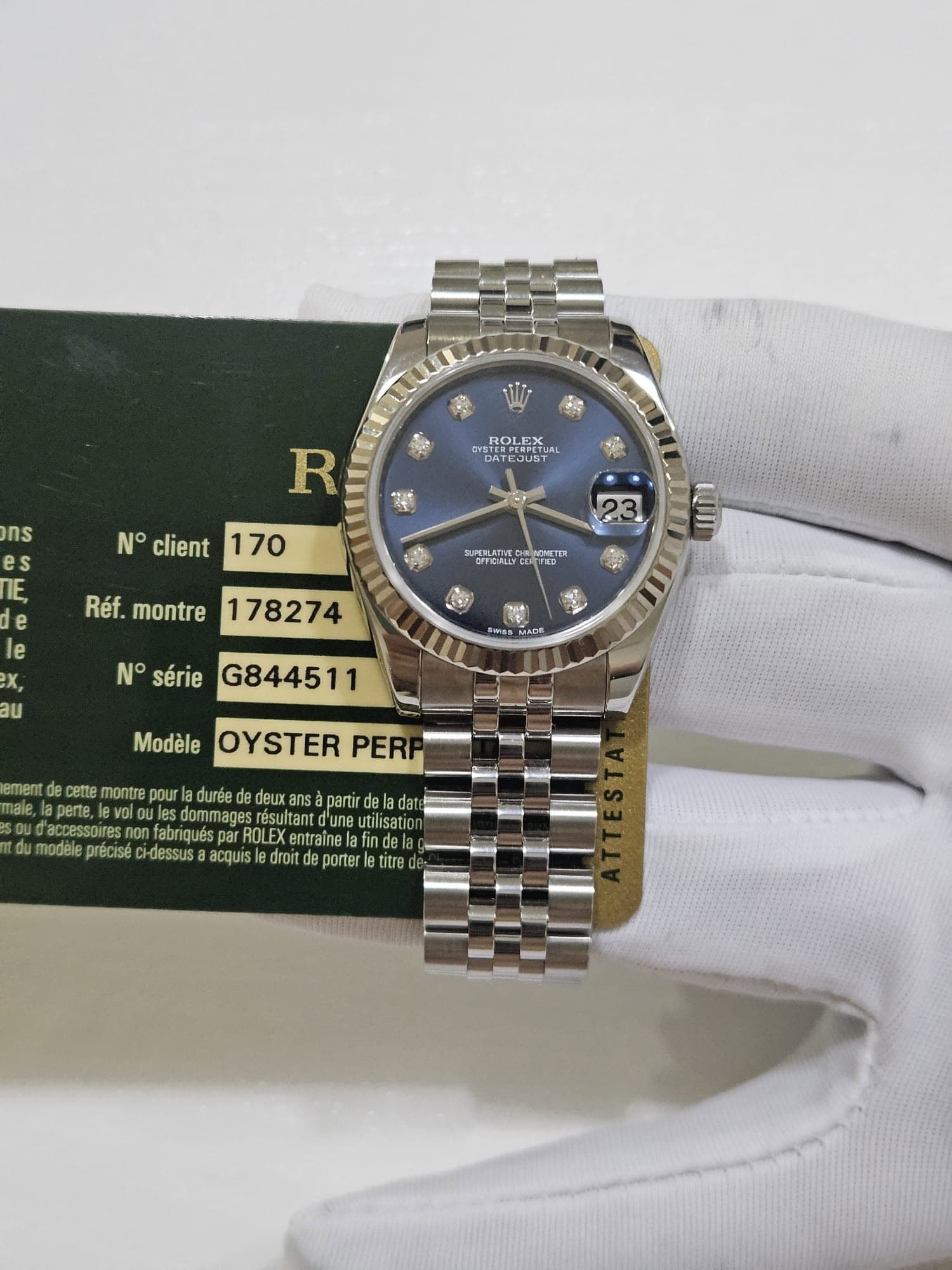May be an image of wrist watch and text that says 'DOLEX ROLEX DATEJUST TEDUST JST ATY DYSTER R N° client ज 170 ns es E, e e X, SUPCRLATIVE Te Réf. montre 178274 แท้า 7 au N° série…