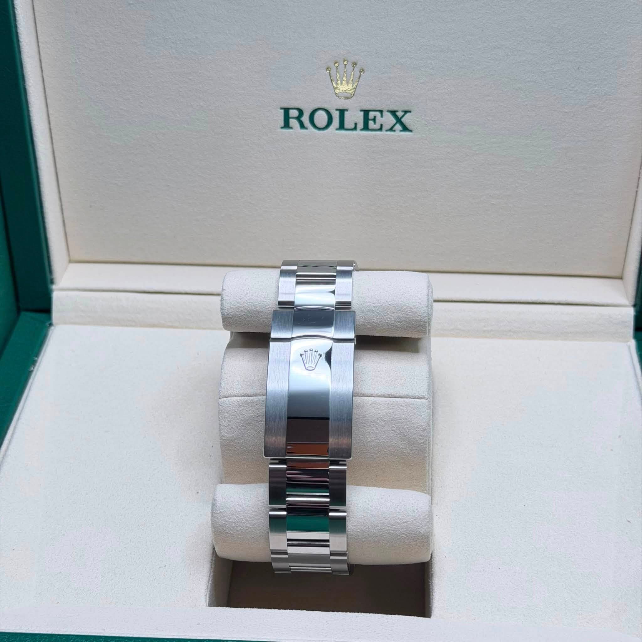 May be an image of wrist watch and text that says 'ROLEX'