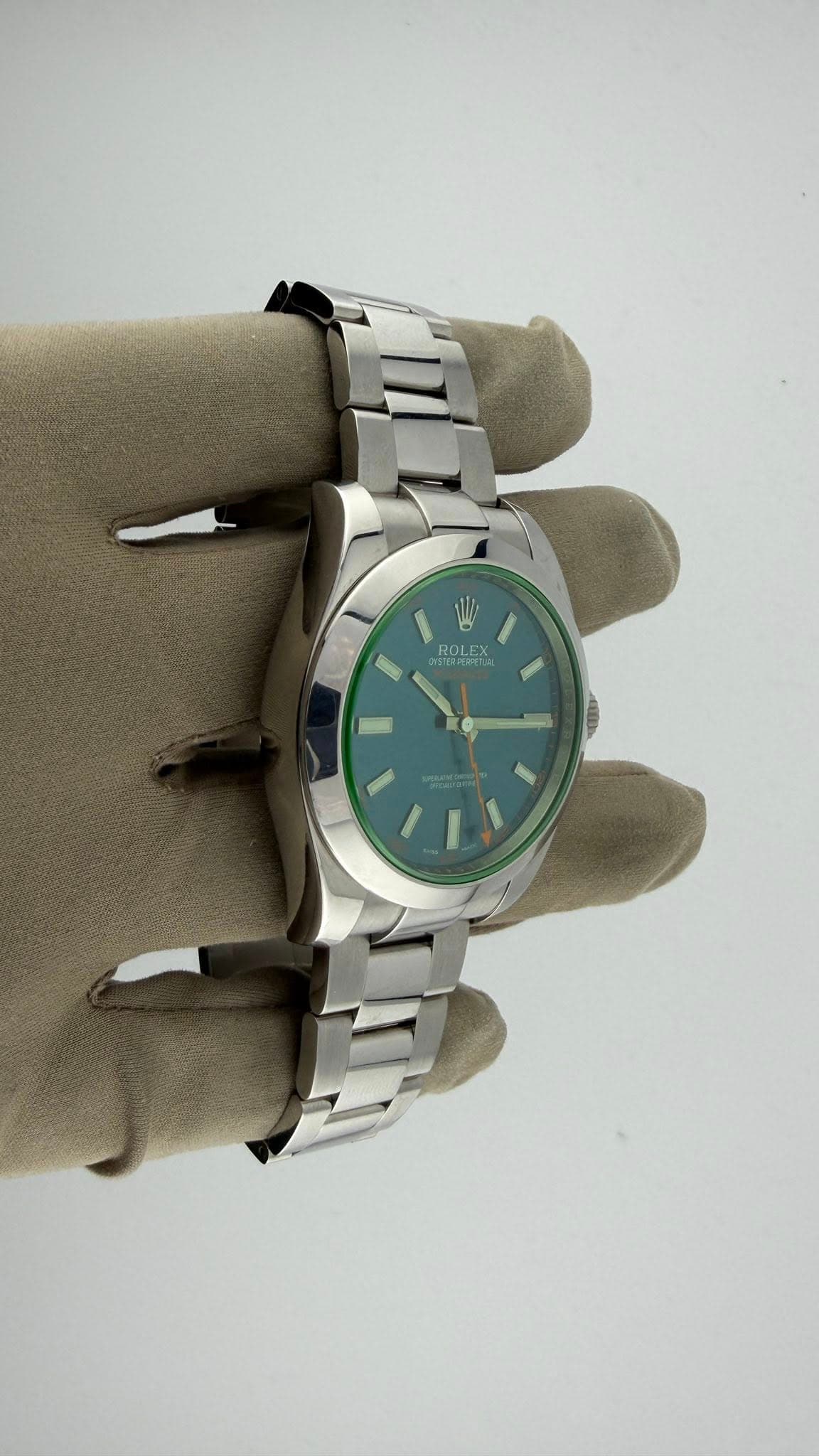 May be an image of wrist watch and text