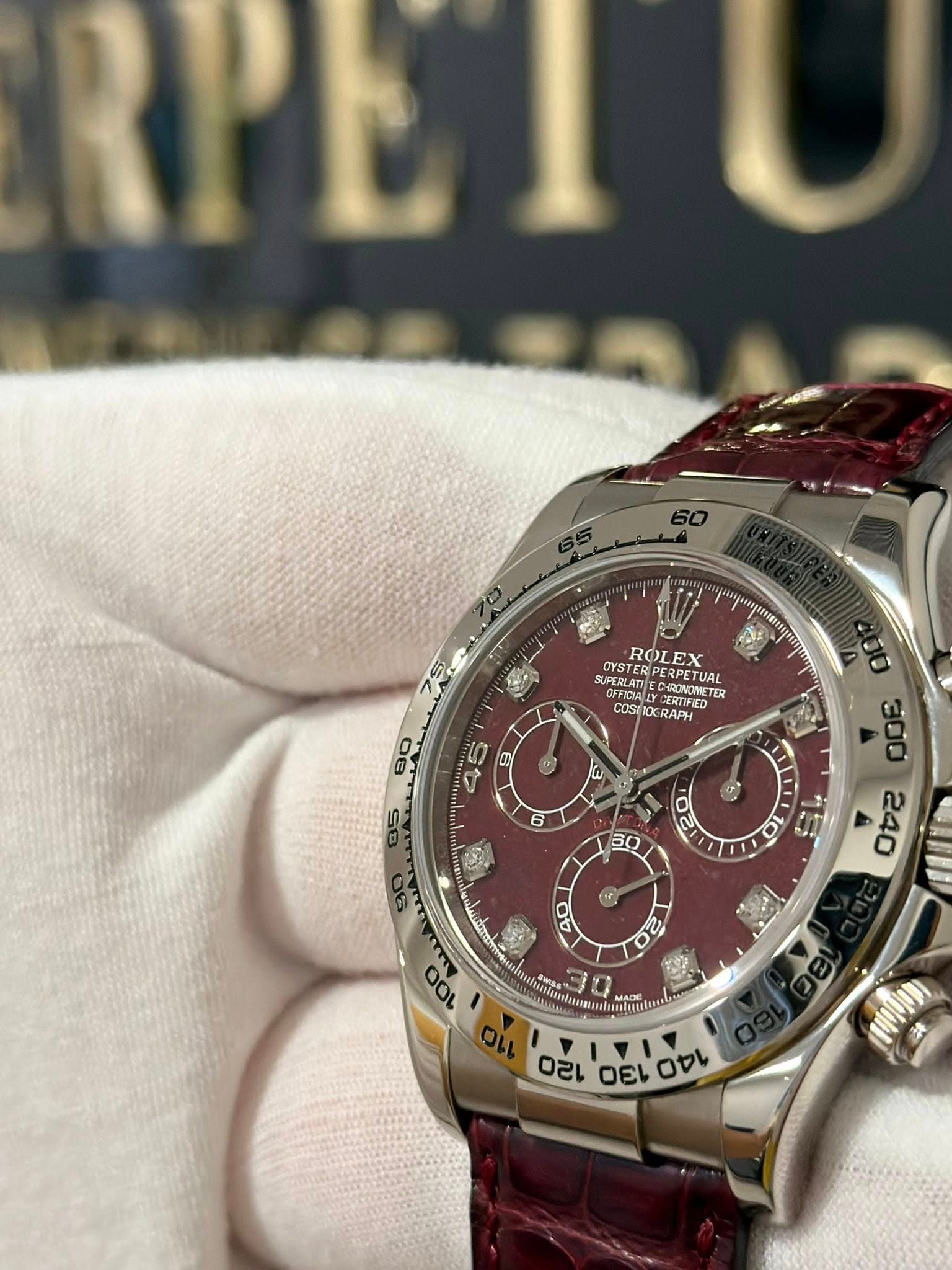 May be an image of wrist watch and text