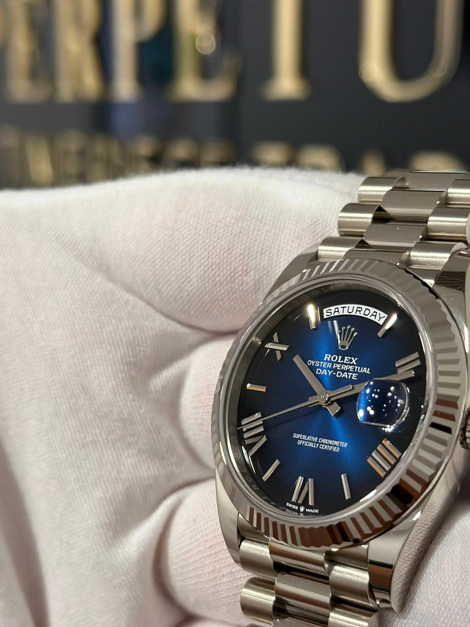May be an image of wrist watch and text