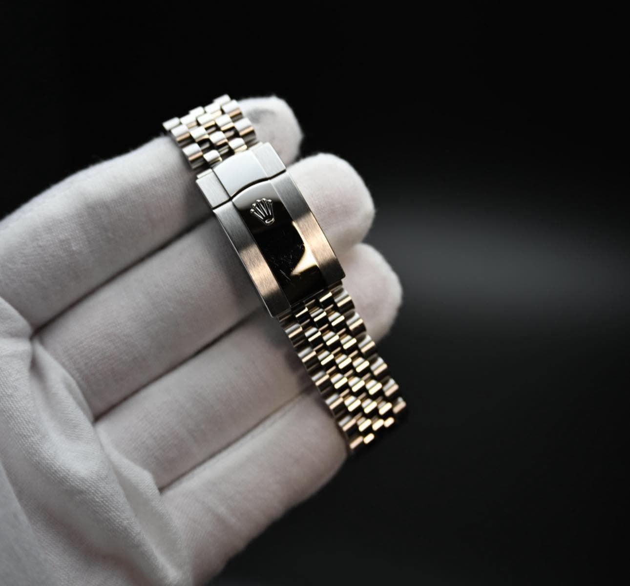May be an image of wrist watch, jewelry and text