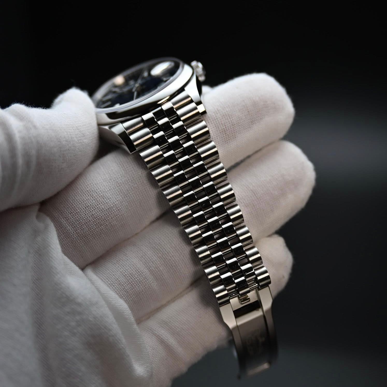 May be an image of wrist watch