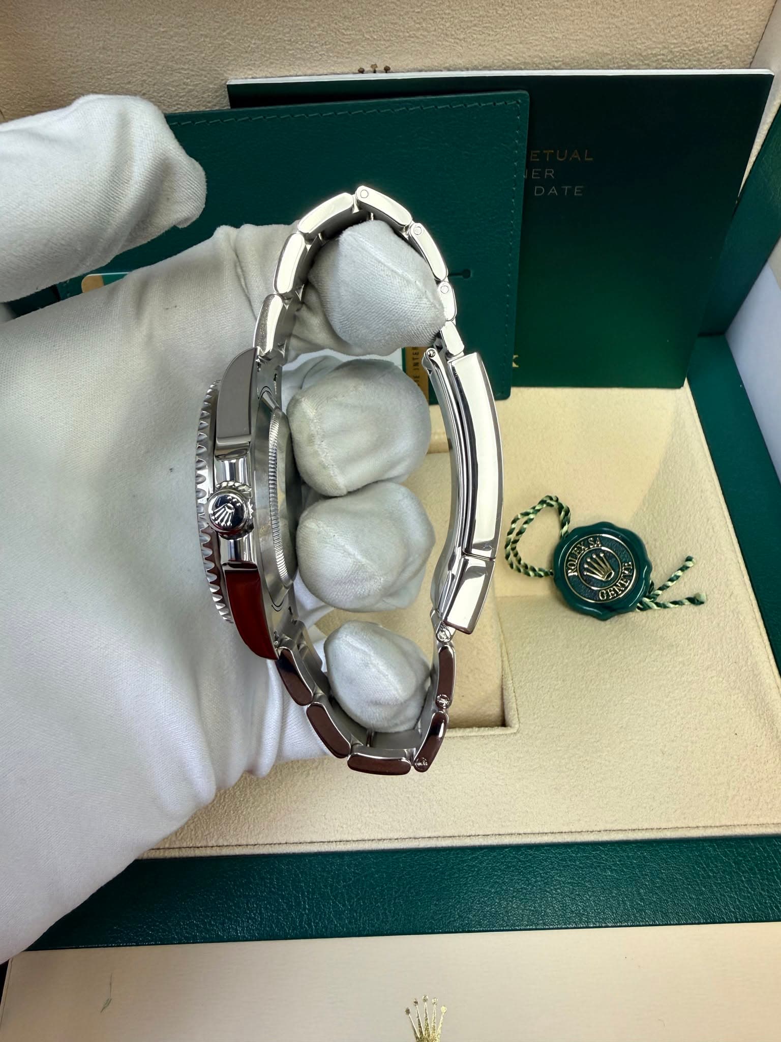 May be an image of wrist watch and text
