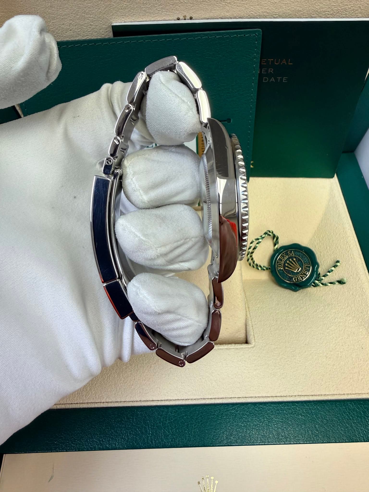 May be an image of jewelry and wrist watch