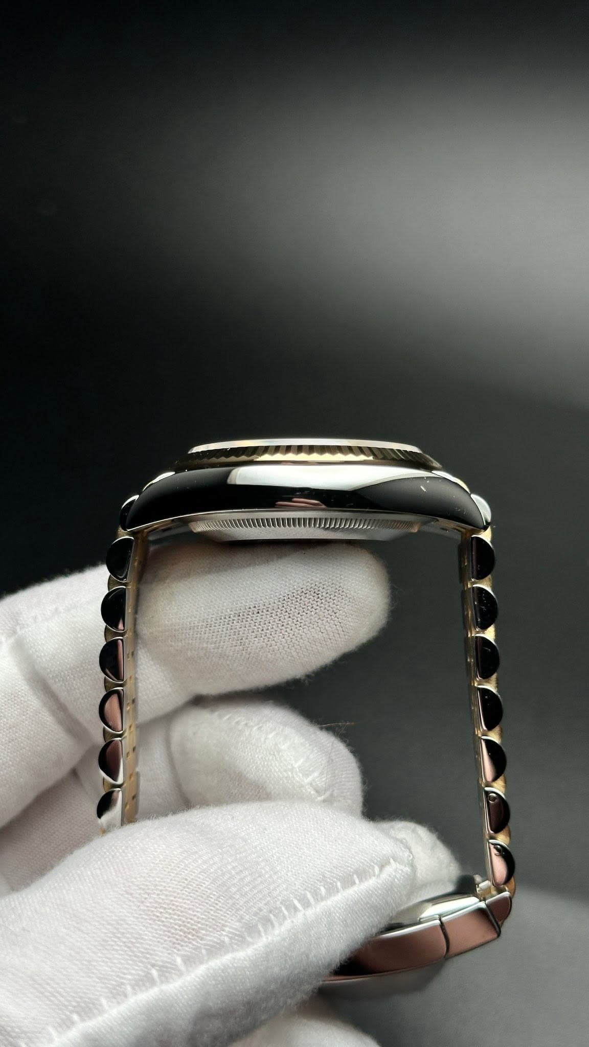 May be an image of wrist watch and jewelry