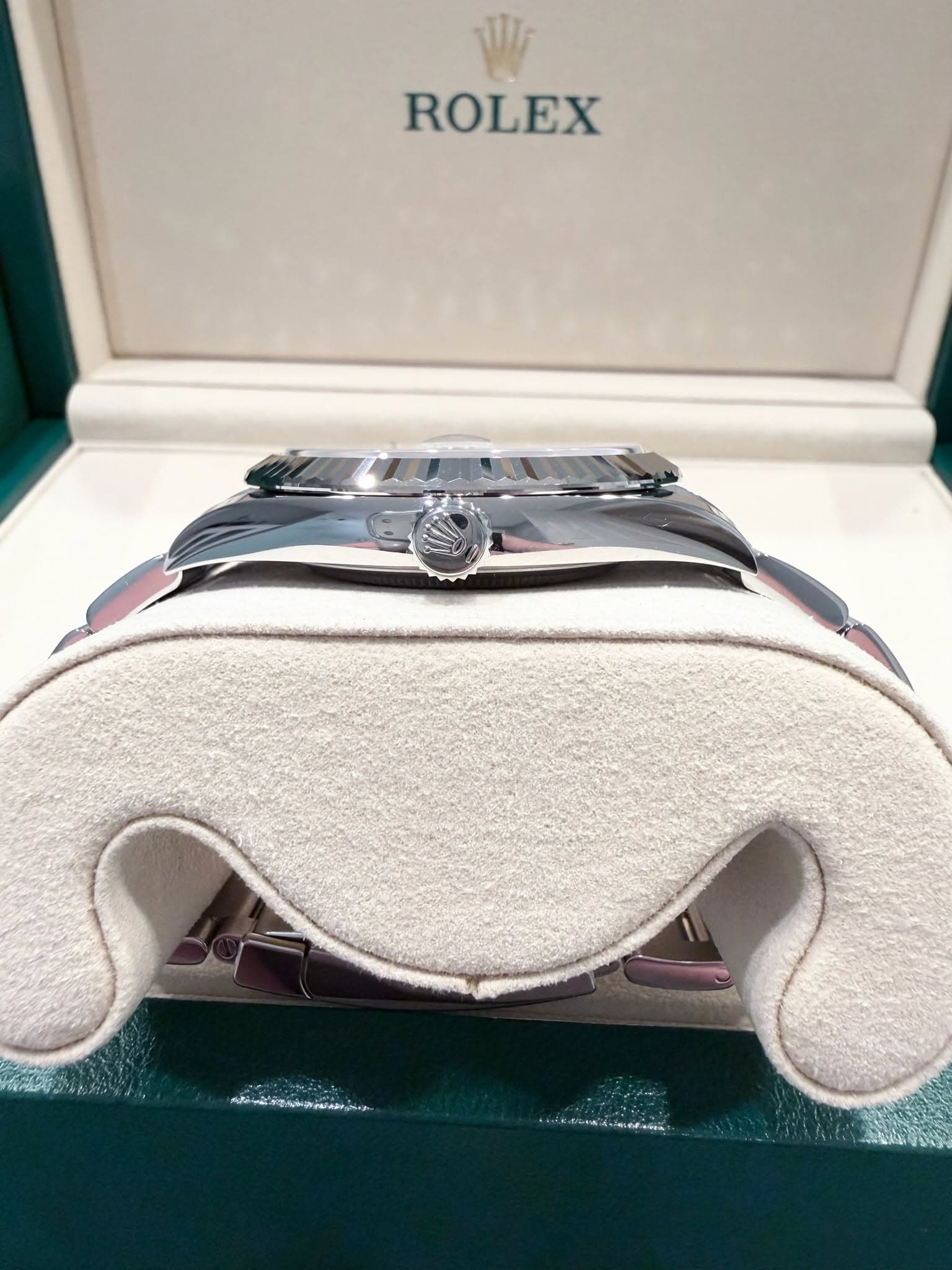 May be an image of wrist watch and text
