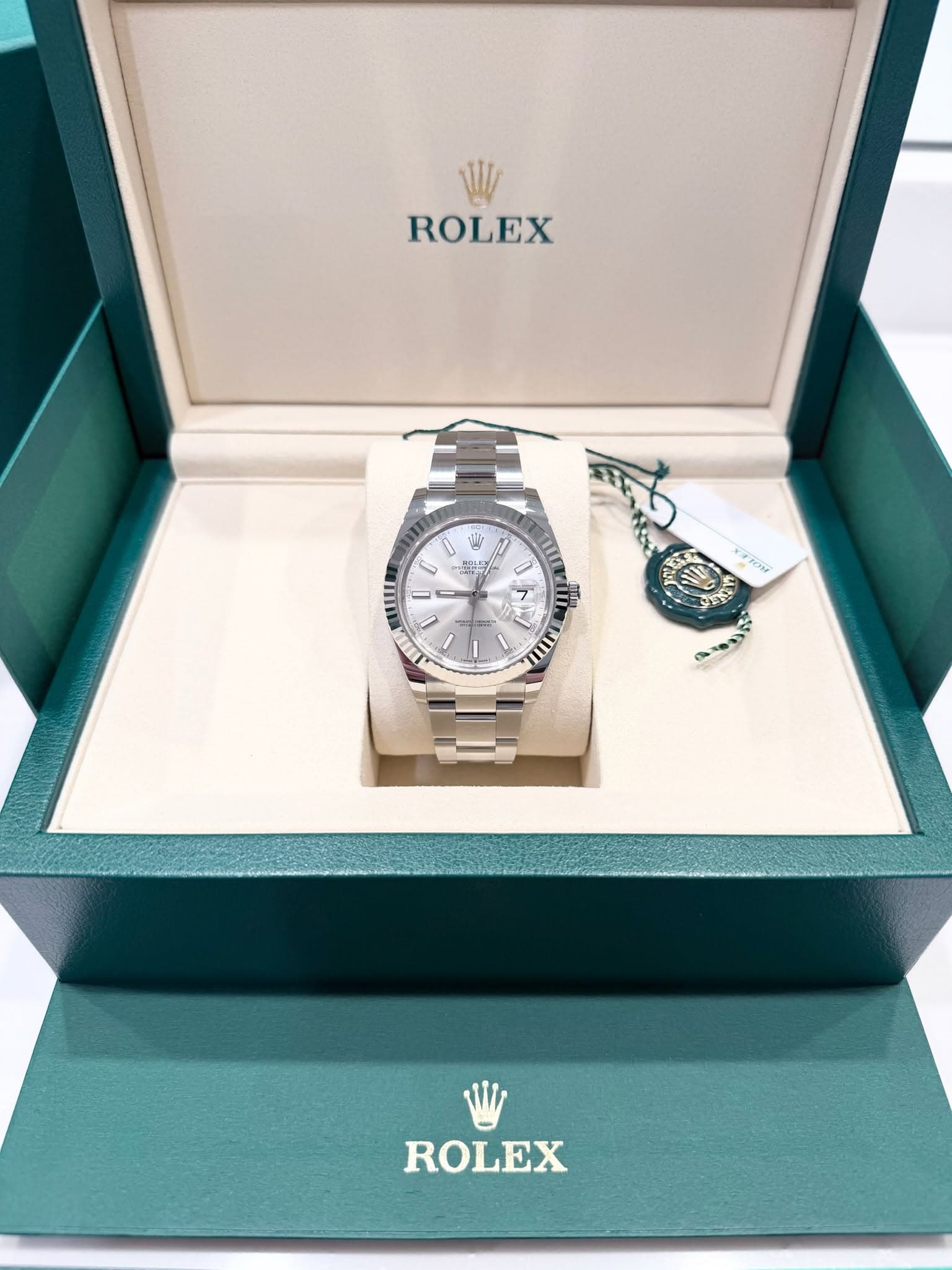 May be an image of wrist watch and text