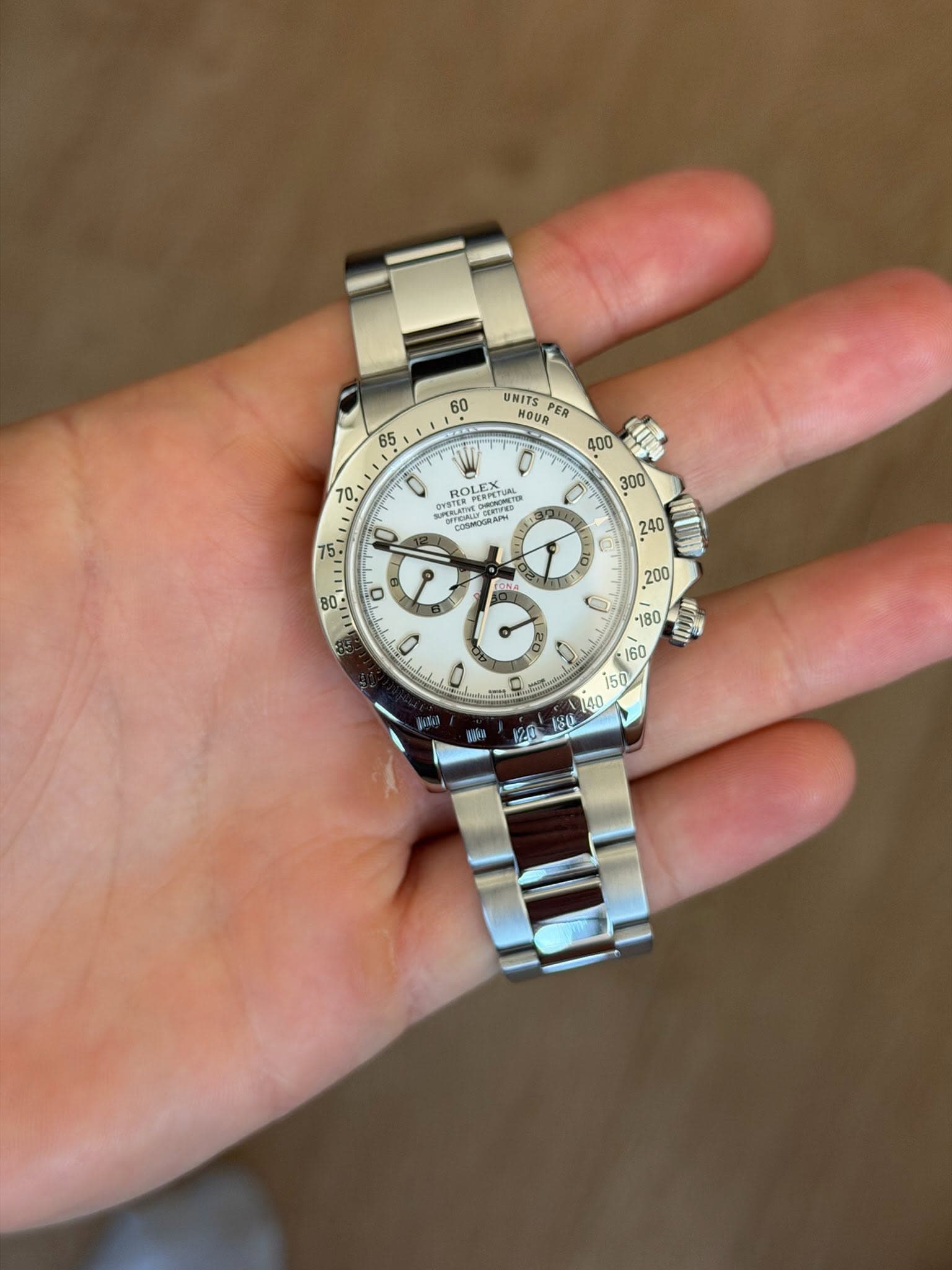 May be an image of wrist watch and text that says '60 UNITS HOUR ER ROLEX ROLP 300 の O O - 委'