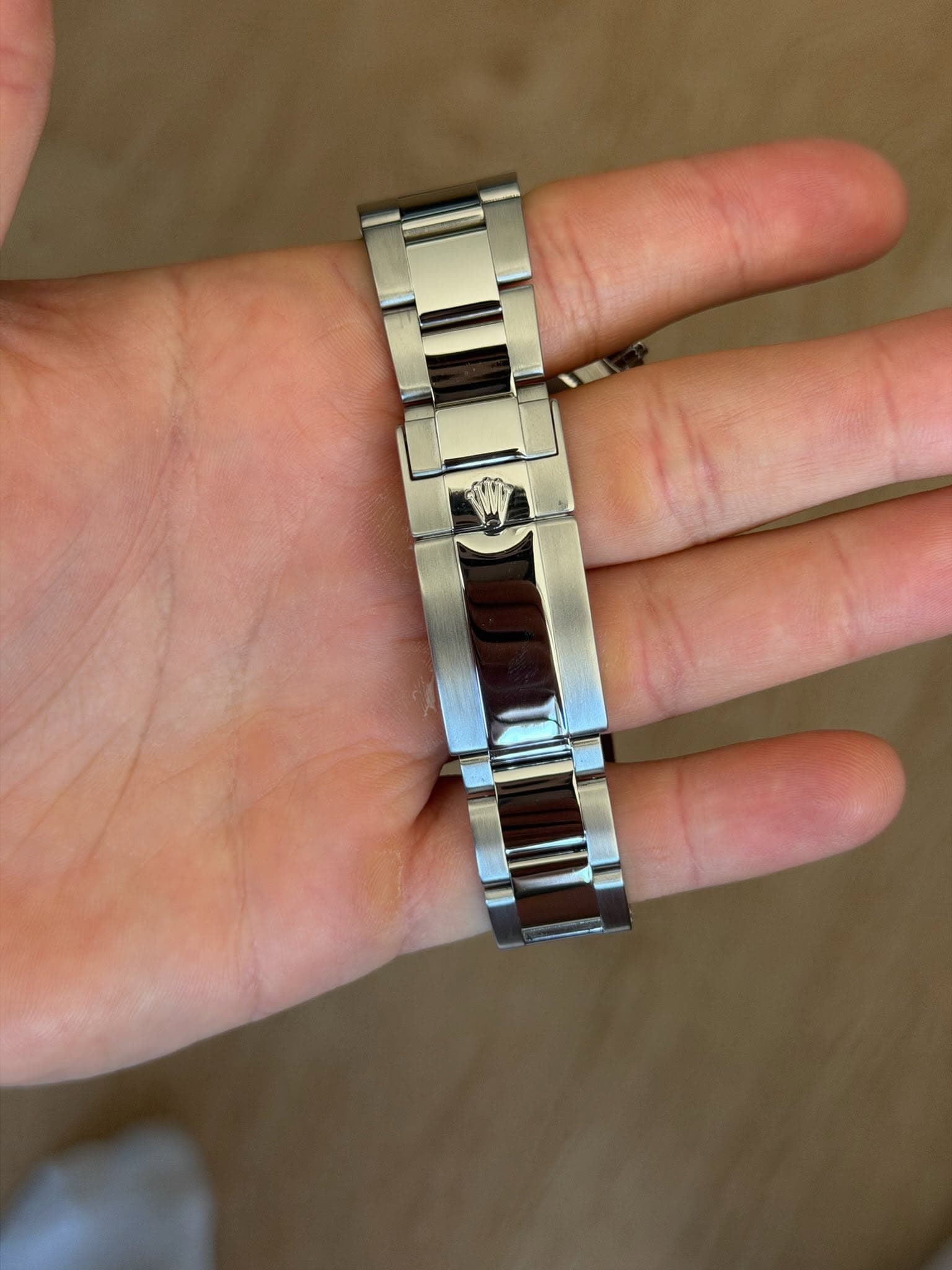May be an image of wrist watch