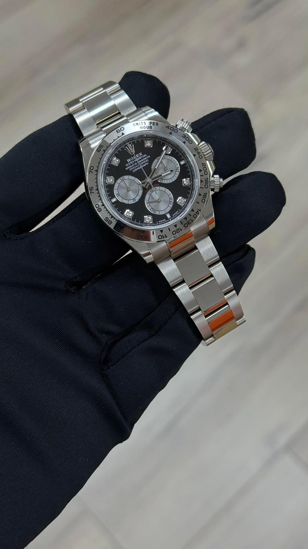 May be an image of wrist watch and text