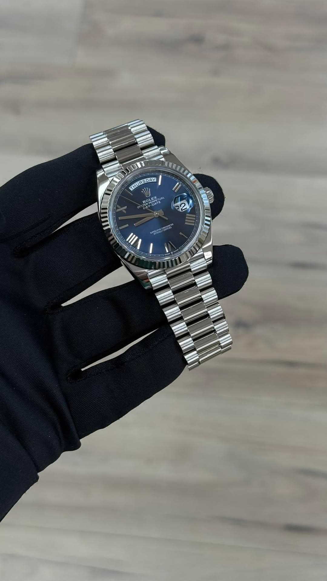 May be an image of wrist watch and text