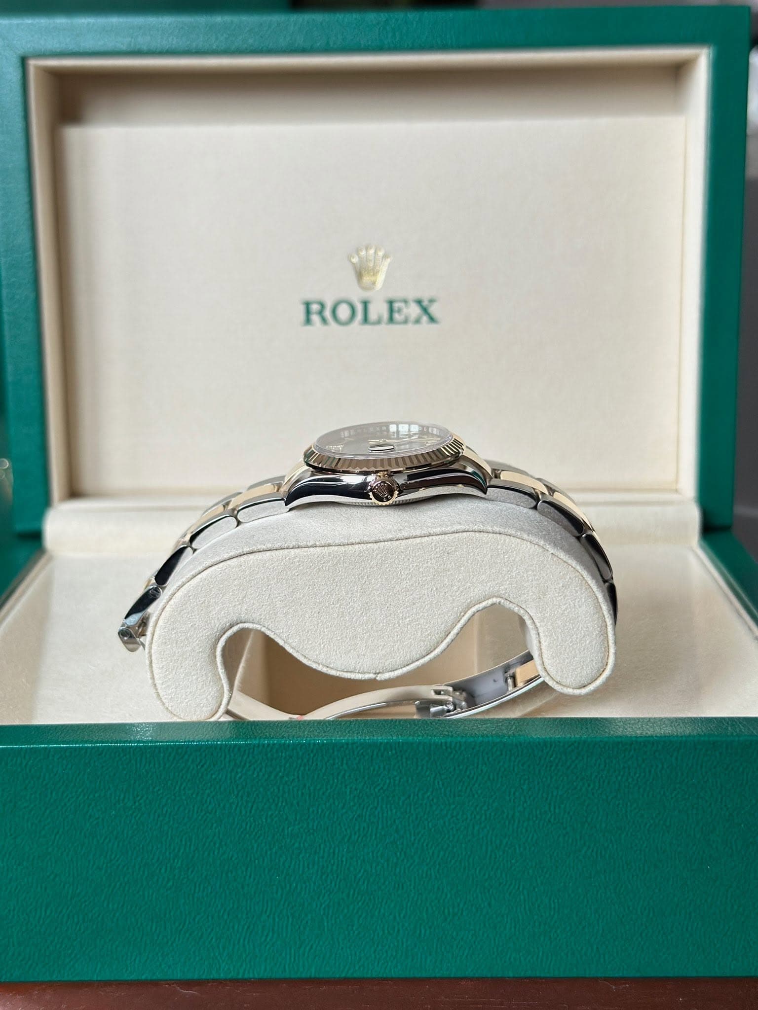 May be an image of wrist watch and text that says 'ROLEX'