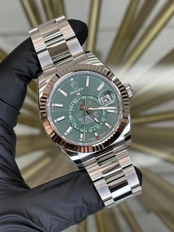 May be an image of wrist watch and text
